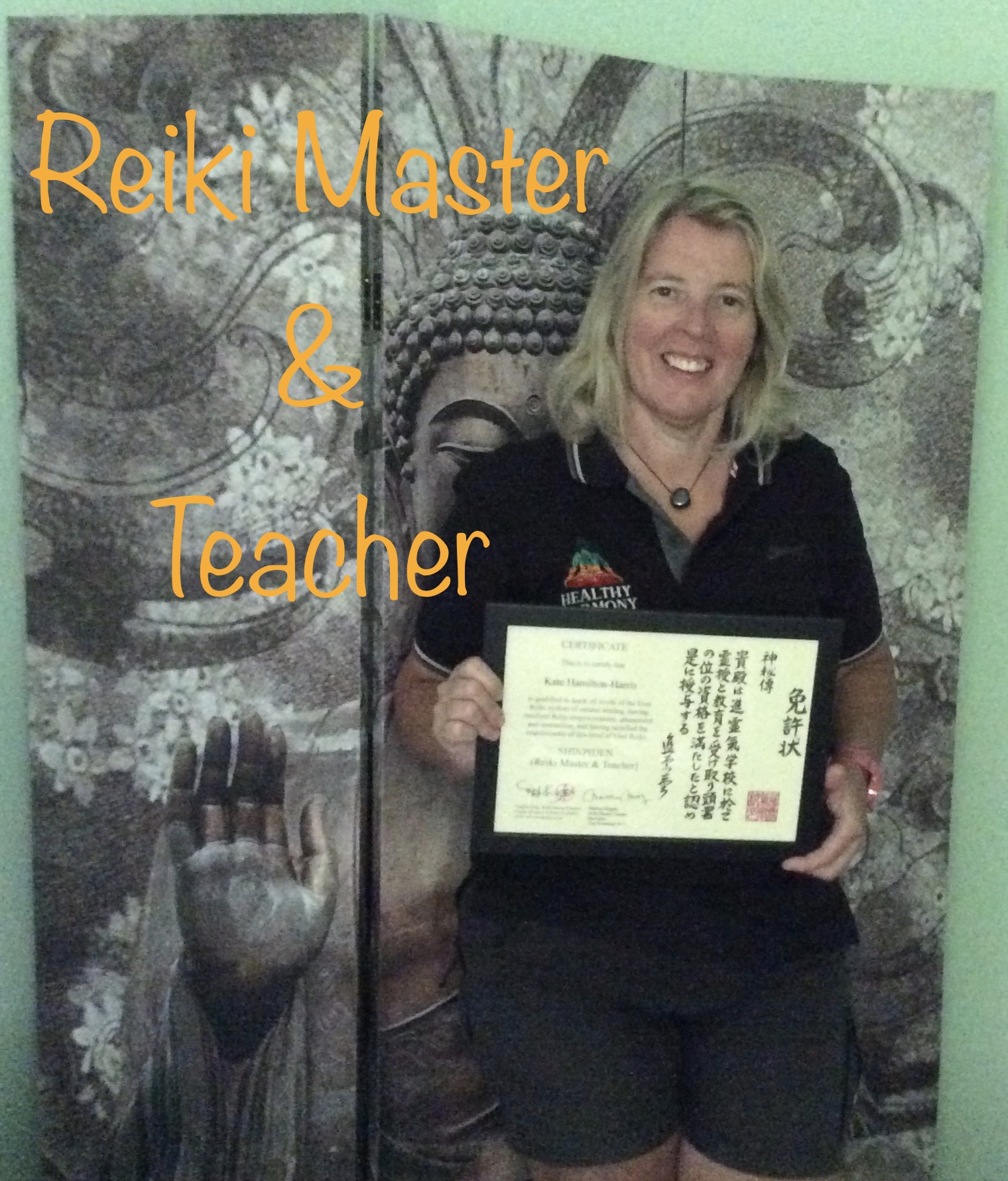 Healthy Harmony Reiki Master and Teacher holding a Reiki certificate